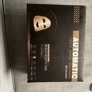 Black and Gold Fruit Mask Machine